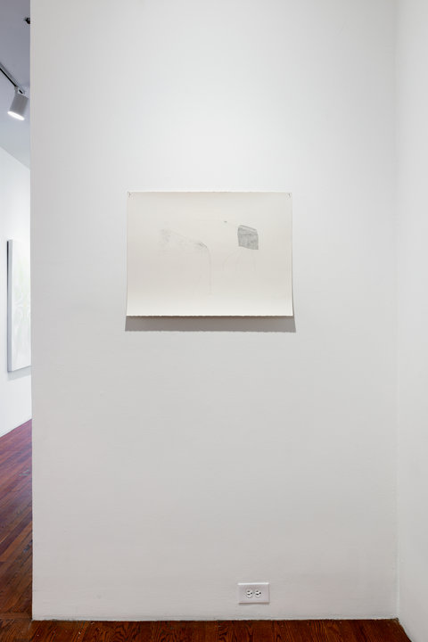 Image of one black and white sketch hung on a white wall in the exhibition space. 