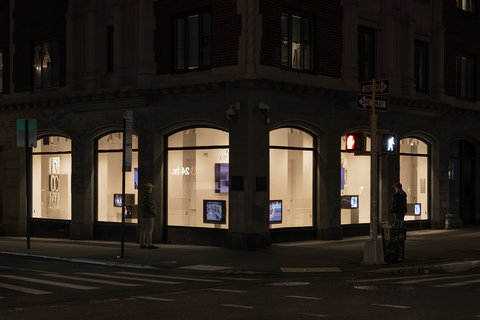 Installation view of all six windows at night. 