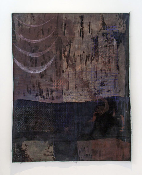 Image of a work in the exhibition featuring dark, abstract colors and shapes that seem to be in a quilted like pattern. 