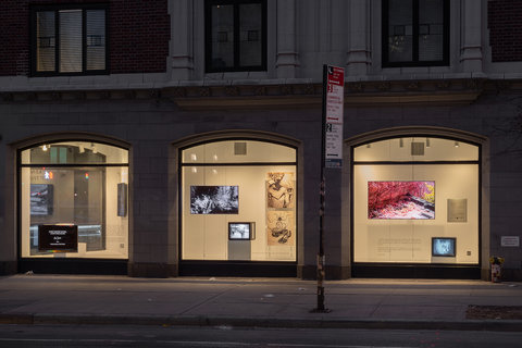 Installation of three windows at night. 