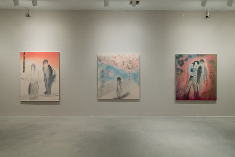 Installation shot of three paintings in the exhibition. 