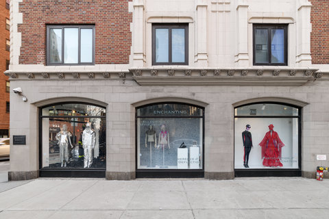 Installation view of three exhibition windows from street view. 