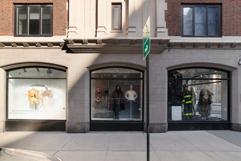 Installation view of three exhibition windows from street view. 