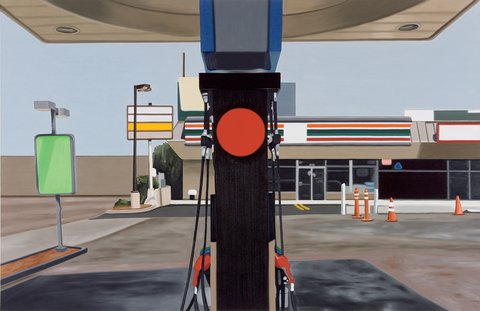 Photograph of a gas station in the middle of a sunny day. The image viewpoint is taken head on. The image features a pump in the middle with the roof of the gas station overhead, creating a crossed shape. In the background, the convenience store of the gas station sits against a blue sky. 